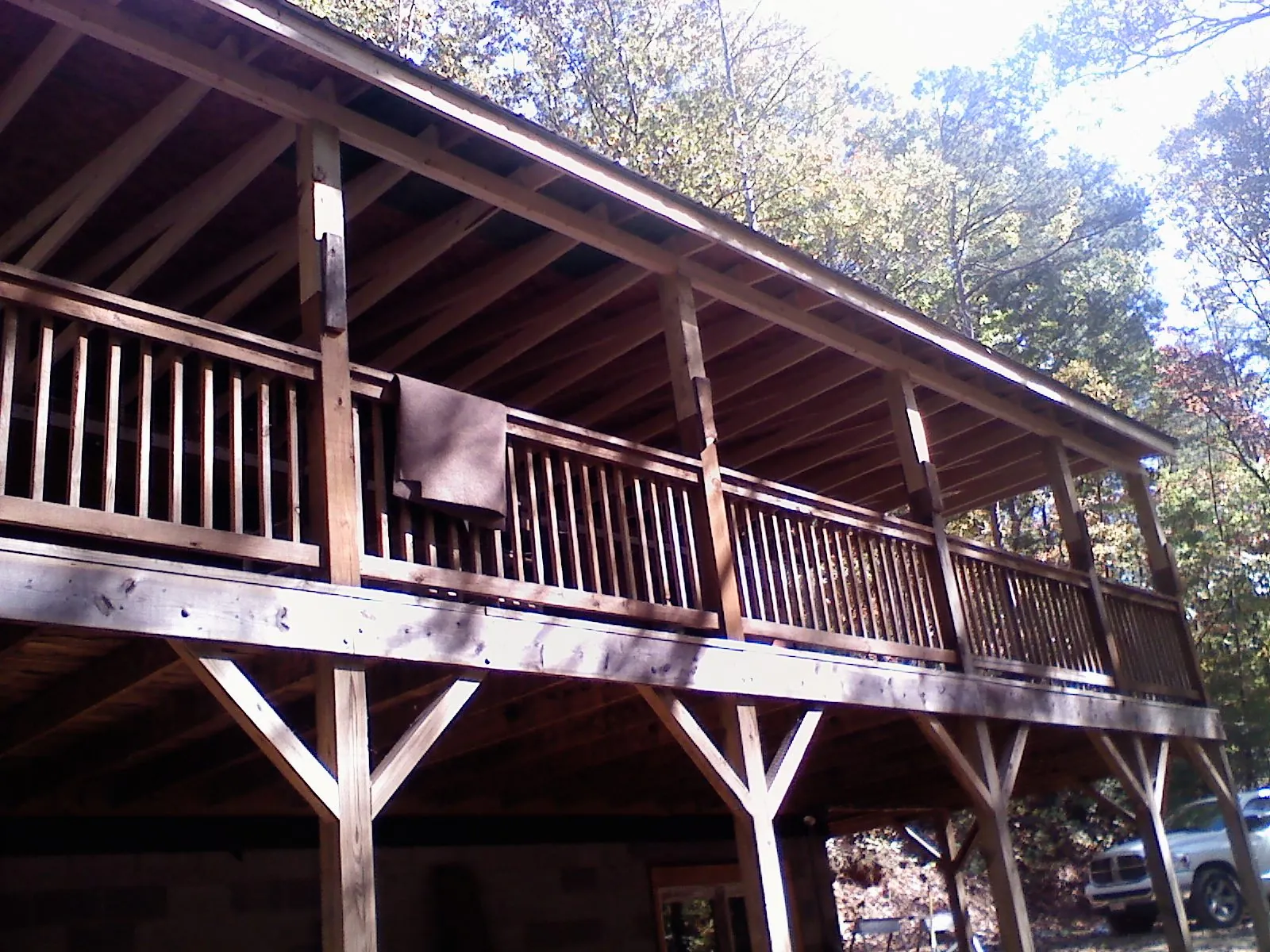 Timber framing under a new elevated porch and deck — Roof Leak Repair in Elburn by Roofing Brothers